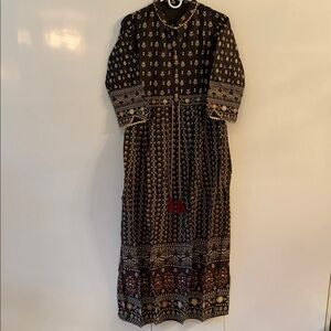 Elegant Black and Gold Patterned Dress